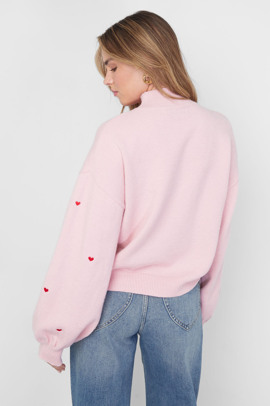 Knitted sweater with hearts
