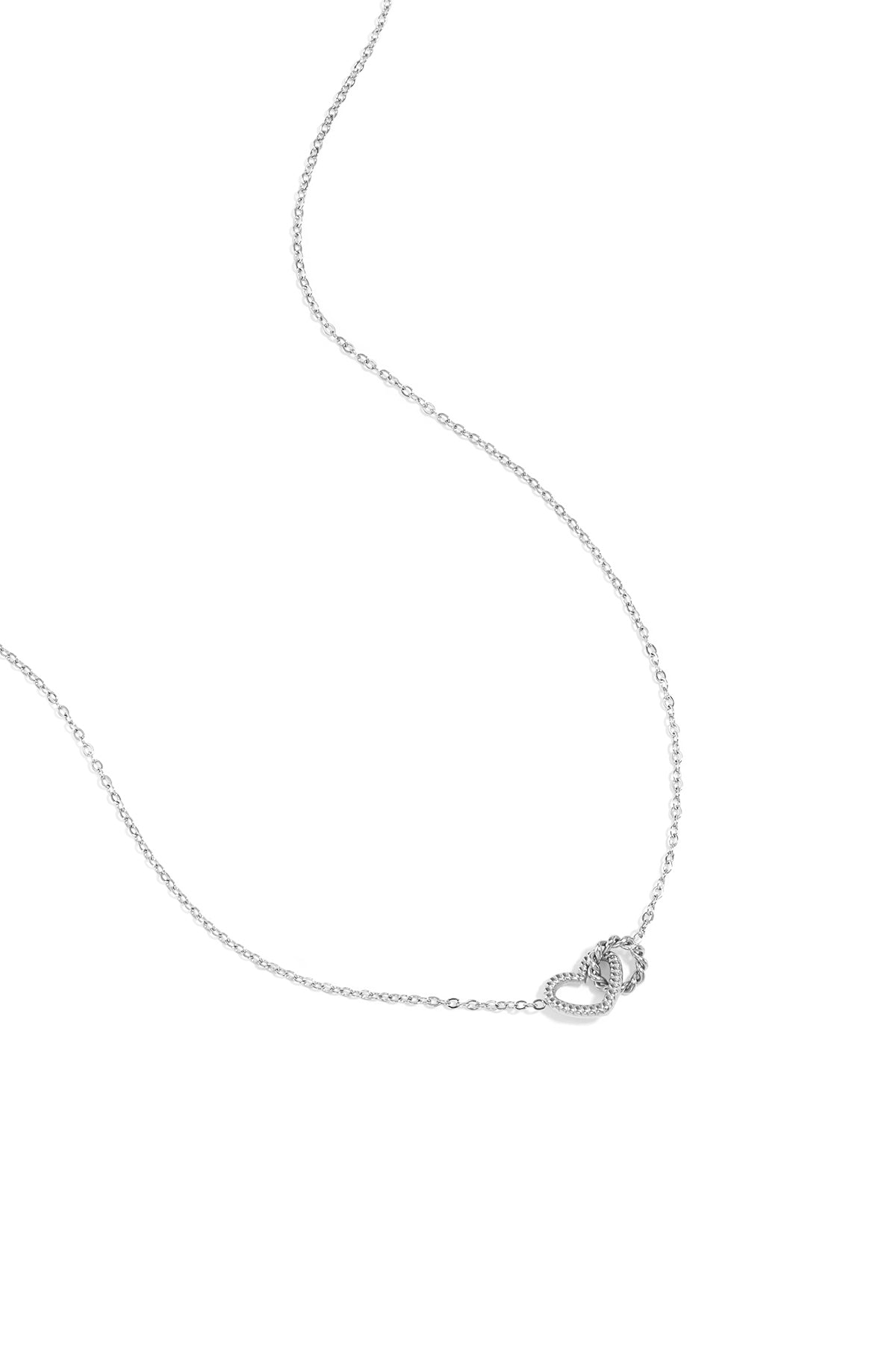 Necklace with connected heart charm