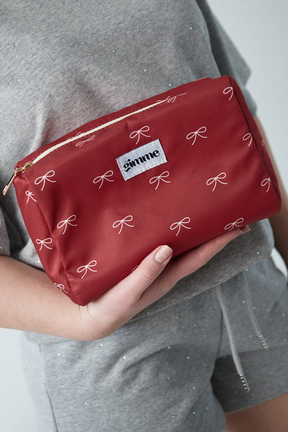 Toiletry bag bows