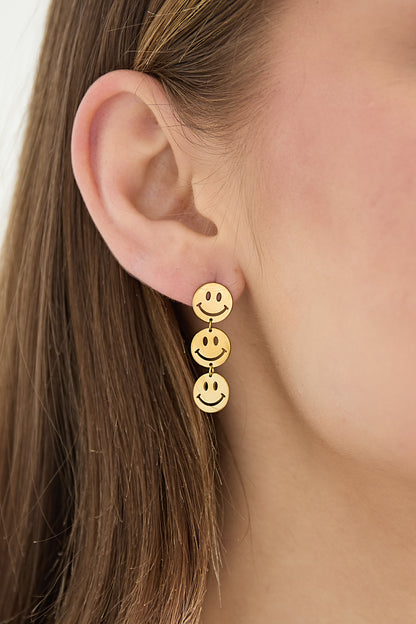 Ohrhänger aus Edelstahl mit lächelndem Gesicht, schlichte und lässige Kollektion für Damen.
