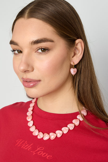Earrings with heart-shaped beads