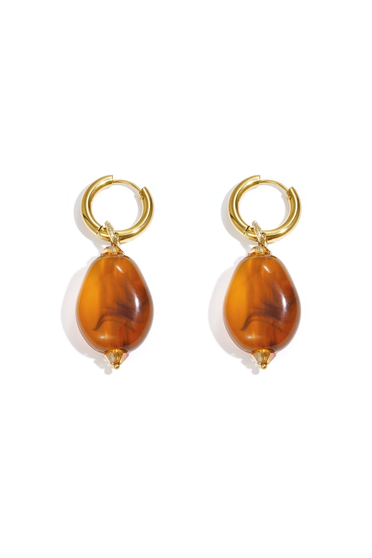 Earrings with asymmetrical bead