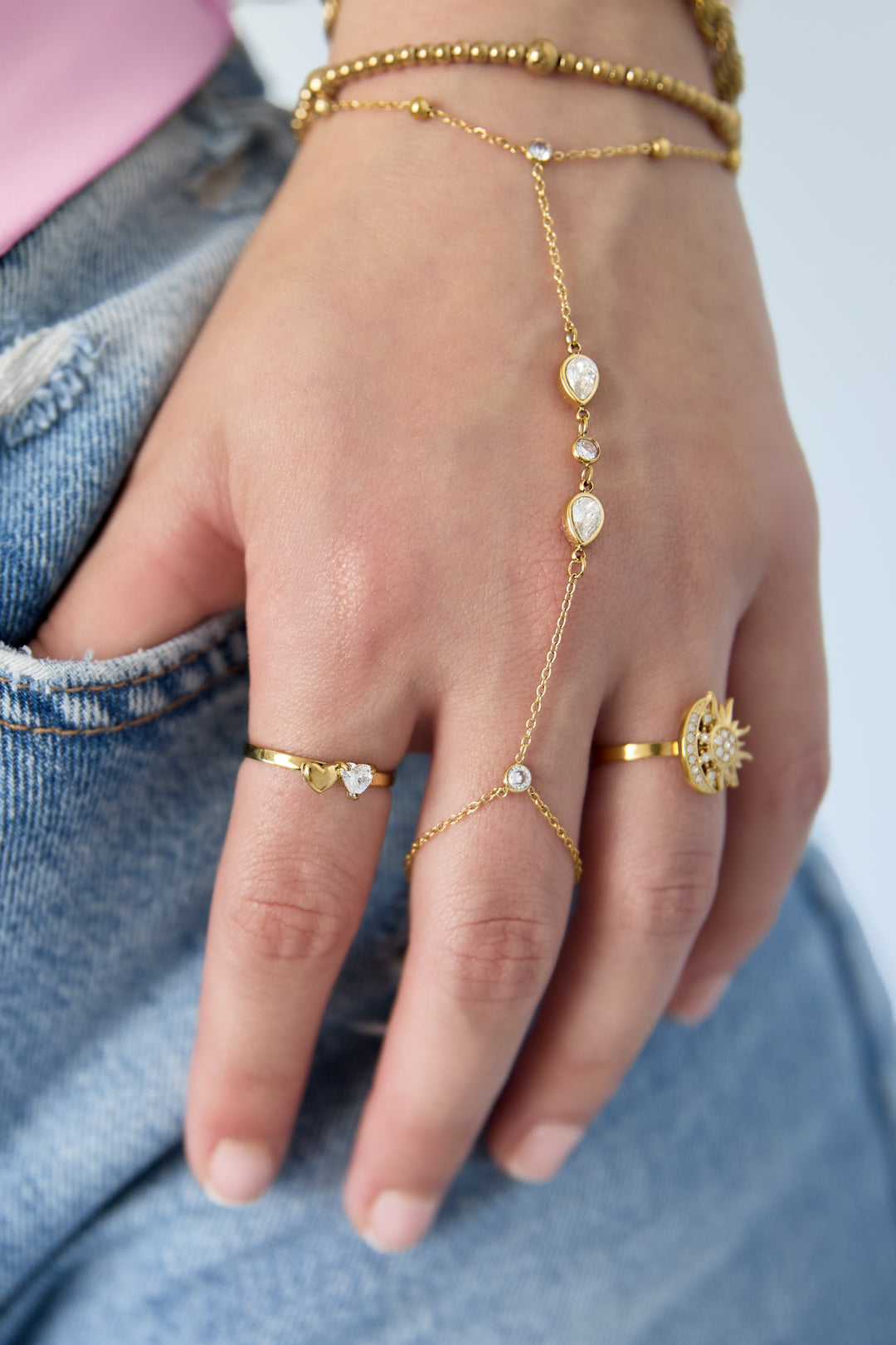 Verstellbarer Ring mit herzförmigem Stein und kleinem Herz