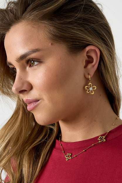 Earrings with coral-shaped flower and stone detail