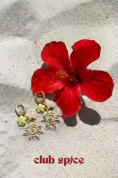 Oval hoop earrings with sun and bead charms