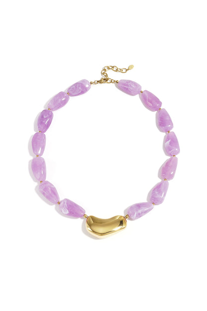 Necklace with asymmetric statement bead