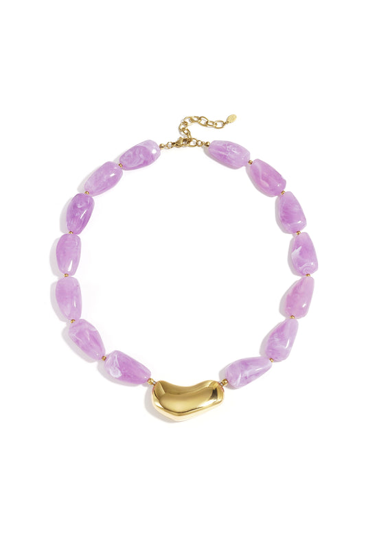 Necklace with asymmetric statement bead
