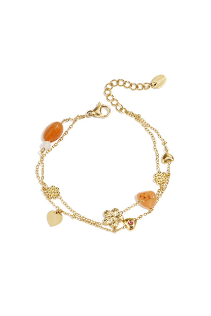 Charm-Armband mit orangefarbenen Perlen, Blumen und Herzen