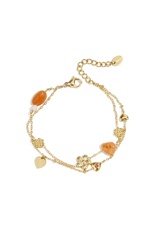 Charm-Armband mit orangefarbenen Perlen, Blumen und Herzen
