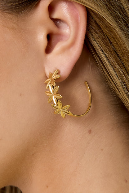 Hoop earrings adorned with flowers