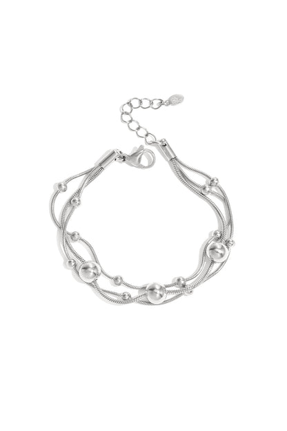 Armband mit Ketten und Punkten