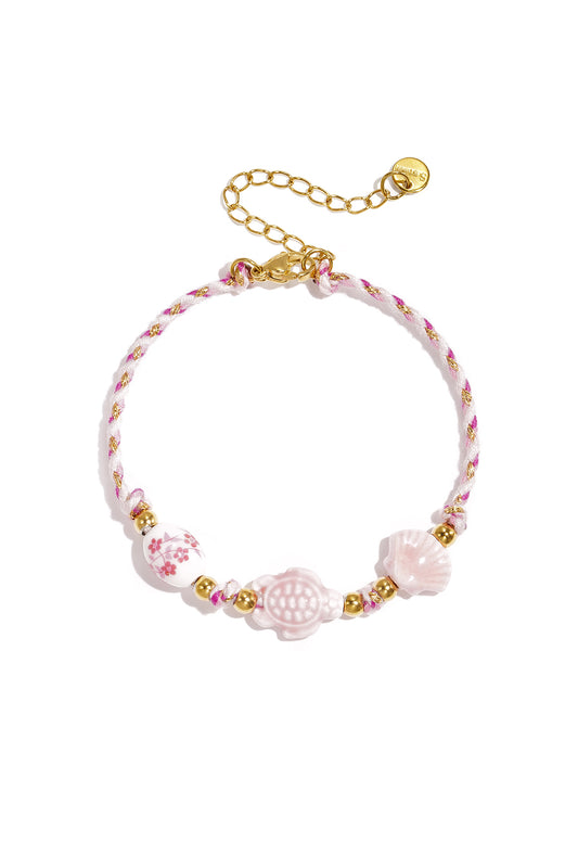 Armband mit Schildpatt- und Muschelperlen und Seilmotiv