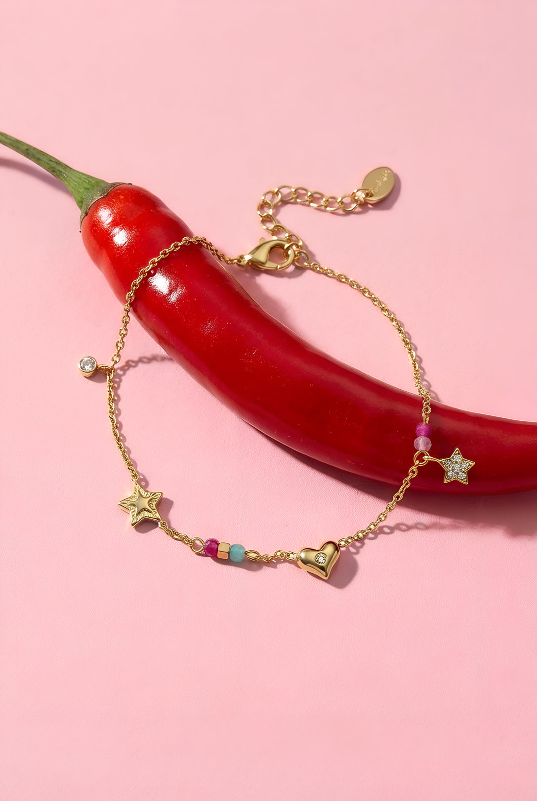 Charm-Armband mit Herz, Stern, Steinen und Perlen