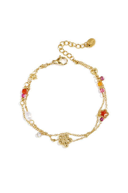 Charm-Armband mit Stern- und Blumenanhängern, Perlen, Steinen und Perlen