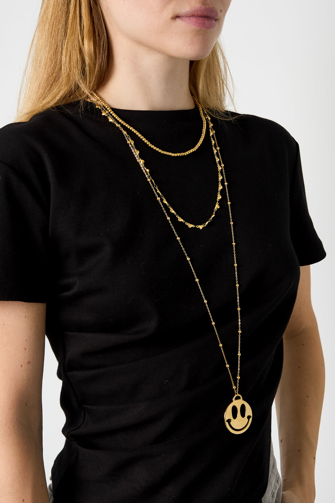 Lange Halskette aus Edelstahl mit lächelndem Gesicht, lässig-schlichte Serie, Damenschmuck