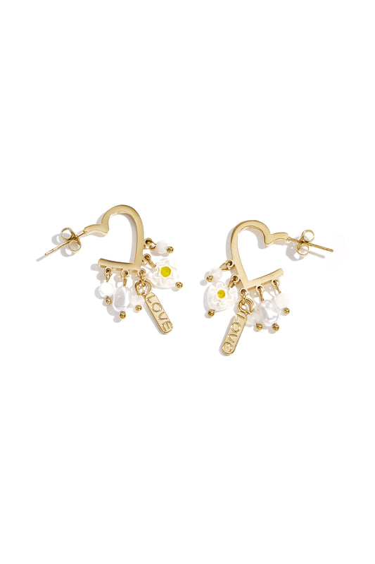 Heart-shaped earrings with hanging beads and charms