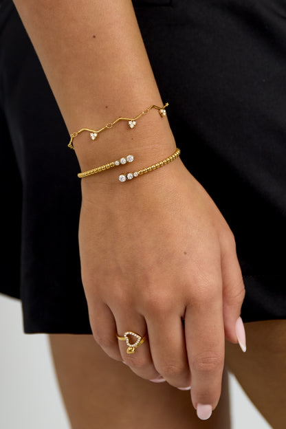 Armband mit Zickzackmuster und Steinen