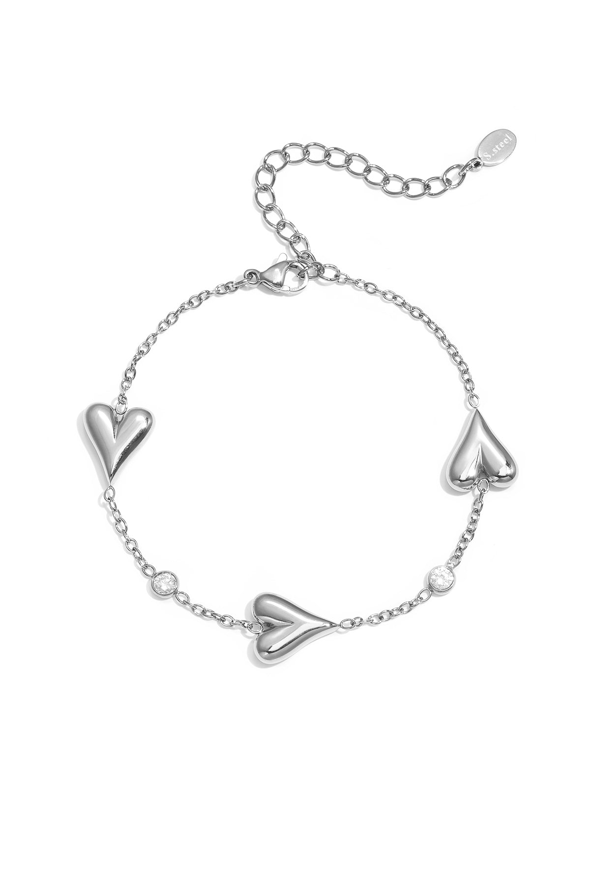 Armband mit drei massiven Herzen und Steinen